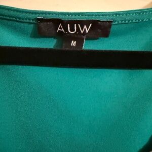 Green blouse with gold neckline